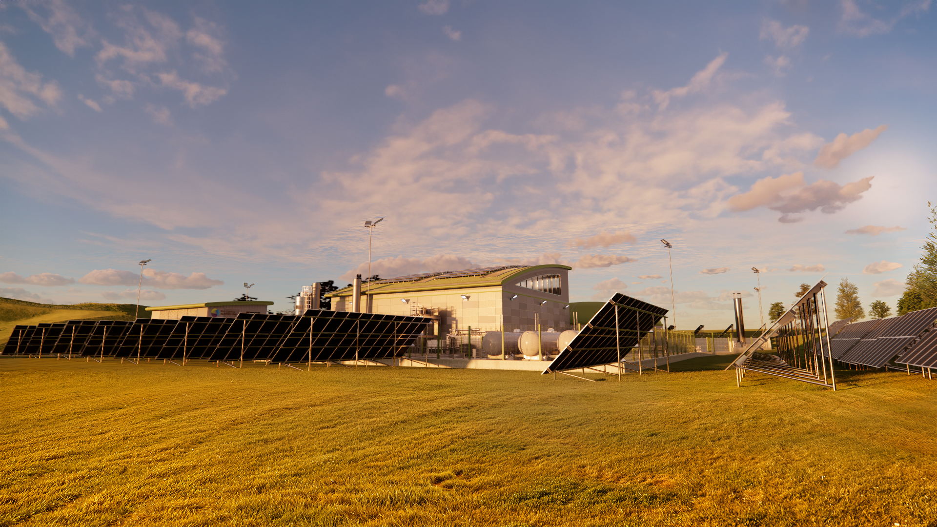 Solar arrays at sunset beside the facility